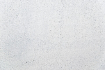white uneven rough background with weak toning