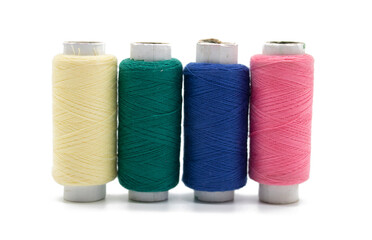 Colored spool of thread isolated on white
