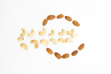 peanuts and almond nuts isolated on white background.