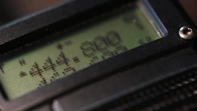 slow slide over a handheld HAM radio from bottom to top