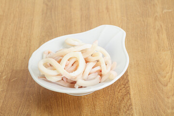 Marinated squid strips in the bowl