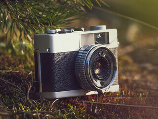 Vintage rangefinder film camera in natural outdoor