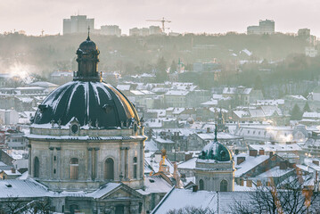 Lviv, Ukraine - February, 2022: City view from the Vysoky Zamok (Lviv castle hill), the dome of Dominican church.