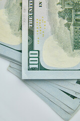 Flat lay Closeup on the bills for a US hundred dollar banknote