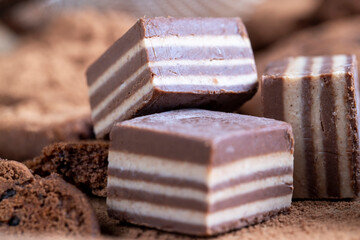 multi-layered sweets made of cream and chocolate layers