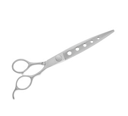 Scissors for cutting people and pets. Grooming scissors. Closed scissors on a white isolated background. Side view.