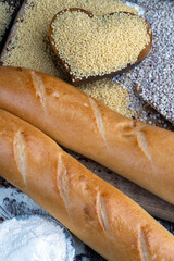 pieces of wheat baguette on a cutting board