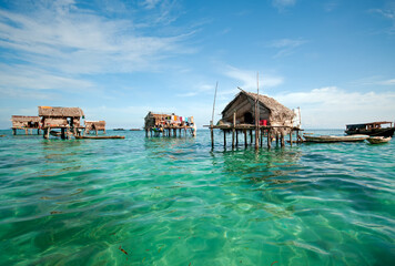 Bajau laut floating village of stilted houses off the coast of Borneo in The Celebes Sea in the...
