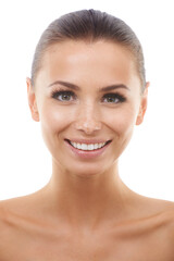 Obraz premium Radiant and happy. Beautiful young woman smiling while isolated against a white background.