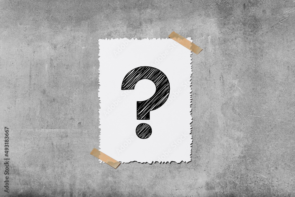 Aufkleber note paper with question mark on textured concrete wall background