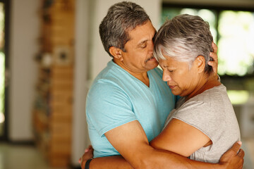 Ive always got you.... Shot of a mature couple embracing at home.