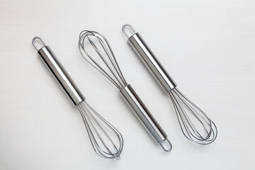 Stainless Steel Kitchen Whisk Egg Beater White Background
