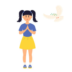 A little girl prays and a white dove with twig flies. International Day of Peace. 