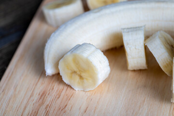 sliced banana on a wooden table while cooking