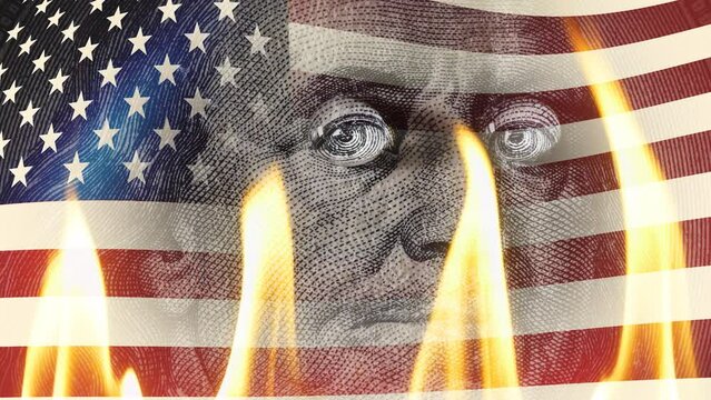 Portrait of Benjamin Franklin on a hundred dollar bill on fire in flames against the background of a waving US flag. Conceptual 4k slow motion video. The idea of ​​a financial crisis.