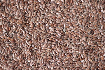 flax seed brown wallpaper close-up.