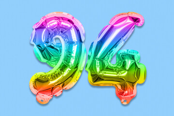 Rainbow foil balloon number, digit ninety four on a blue background. Birthday greeting card with inscription 94. Top view. Numerical digit. Celebration event, template.