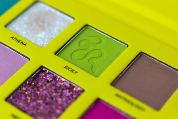 Eye shadow close-up. Professional bright pigments for makeup. Makeup Artist Cosmetics