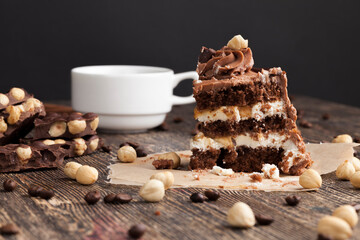 piece of layered cake with nuts and caramel