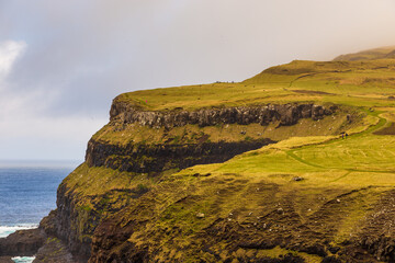 Fototapeta premium View of Mulafossur Waterfall, Faroe Islands.