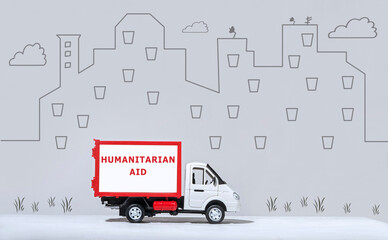 toy van carrying humanitarian aid for refugees
