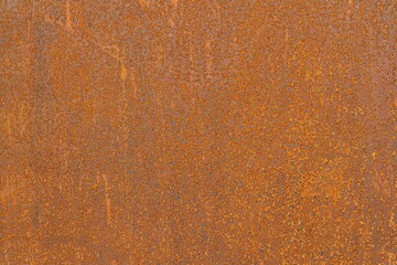 Mur en metal rouillé texturé faisant office de fond unique