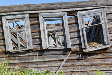 windows of destroyed wooden houses