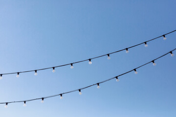 light bulbs on the background of a clear sky