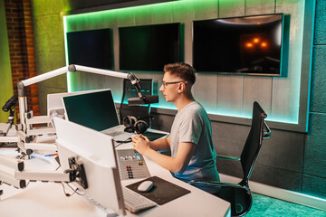The DJ hosts the program and communicates with the audience on air at the radio station. The...