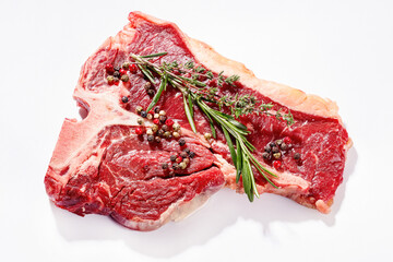 raw t-bone beef steak on a white background