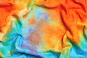 Abstract tie dye multicolor folded fabric cloth Boho pattern texture for background or groovy...