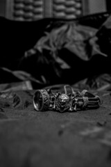 Vertical closeup of men's jewelry 