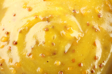 Honey mustard sauce on whole background, close up