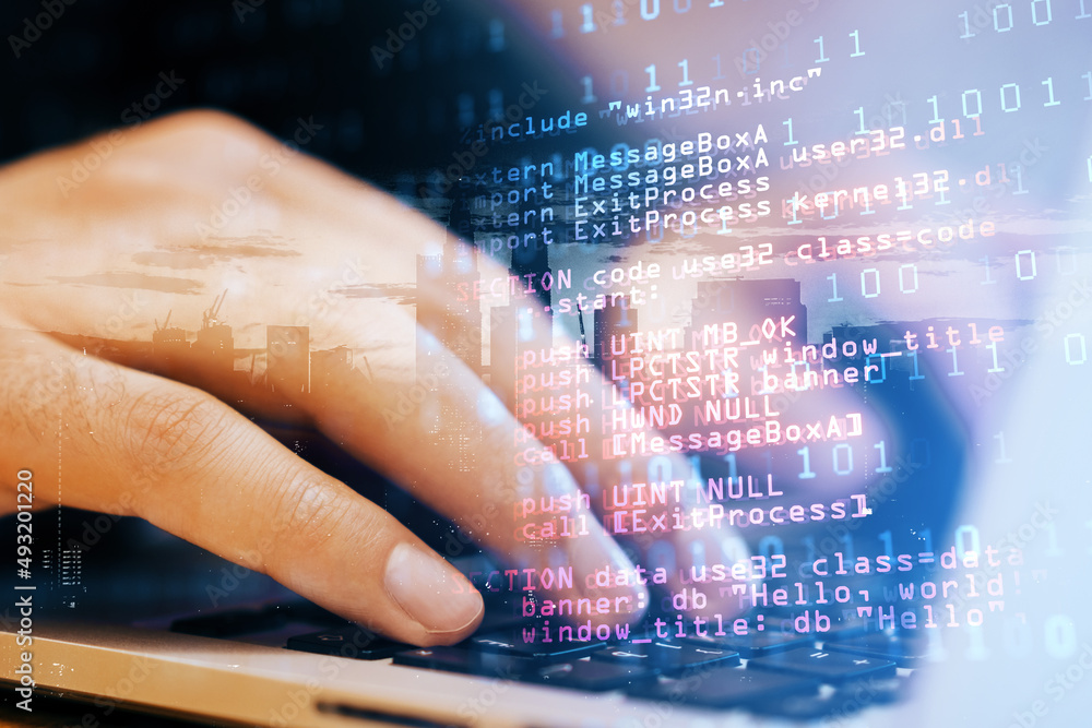 Poster Close up of male student hand using laptop keyboard with abstract html code on creative city background. Coding and programming concept. Double exposure.