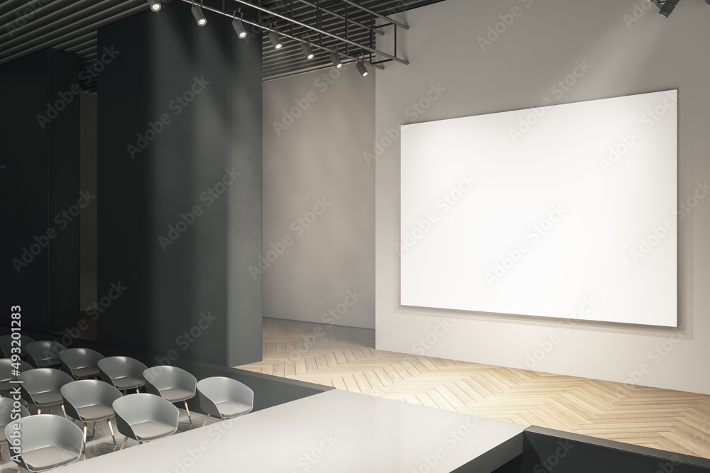 Poster modern concrete auditorium interior with seats, runway and empty mock up poster on wall. presentatio