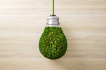 Abstract green grass light bulb on wooden wall background. Eco concept and energy concept. 3D...