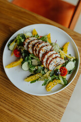 Image of portion of meal with meat and vegetables. Healthy portion of meal with pepper, lettuce, tomatoes and onion