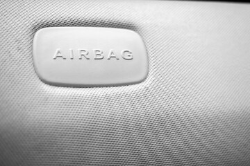 Close-up of airbag sign inside the car