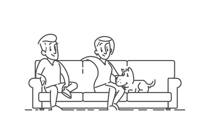 Couple sitting oh the sofa with their dog