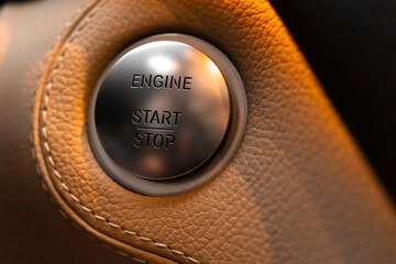 Engine start and stop button in luxury sport car close-up view