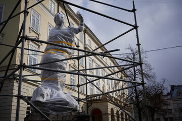 LVIV, UKRAINE- MARCH 11, 2022: War in Ukraine Military Rear, in Lviv close cultural monuments from bombings