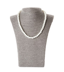 Stylish pearl necklace on jewelry bust against white background