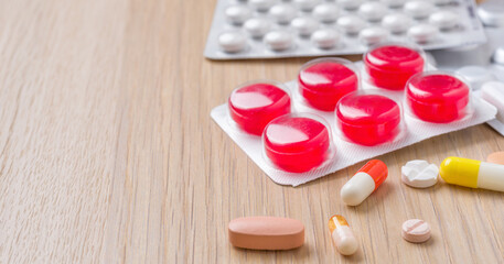 Different medicine pills and capsules with blister packs