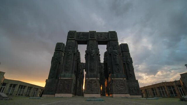 Timelapse view of Monument History of Georgia, North of Tbilisi. Dramatic gray weather, overcast sky. Day time. Summer. Travel and Vacation, tourism concept. Viewpoint, interesting places