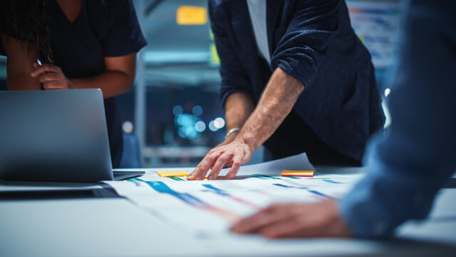 Office Conference Room Meeting: Diverse Team of Top Managers Talk, Brainstorm, Use Digital Tablet. Business Partners Discuss Financial Reports, Plan Investment Strategy. Team of Three