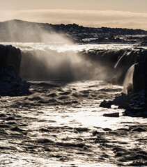 Selfoss waterfall back light long exposure in Iceland