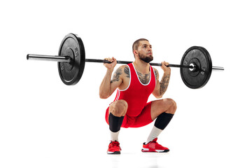 Obraz na płótnie Canvas Close-up strong man red sportswear raising barbell up isolated on white background. Sport, weightlifting, power, achievements concept