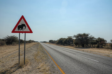 elephant on the road warning sign