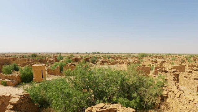4K shot of the abandoned Kuldhara village near Jaisalmer, Rajasthan, India. Panning shot of old ruins of haunted Kuldhara village.	