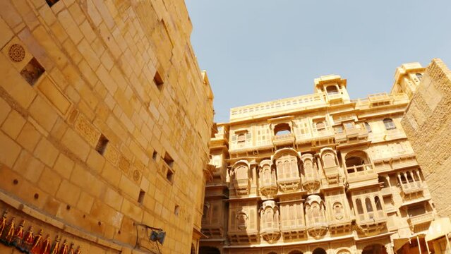 4K Wide angle shot of Patwon ki Haveli at Jaisalmer in Rajasthan, India. Old haveli made of sand stone at Jaisalmer. Ancient architecture of India